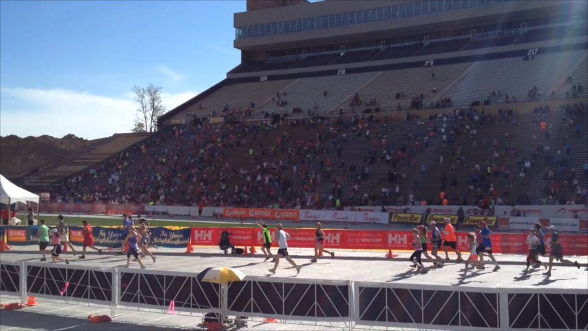 BolderBoulder: Jeff crosses the finish line (white/gray shirt)