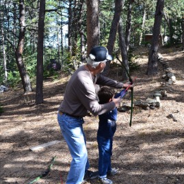 Ted gets an archery lesson