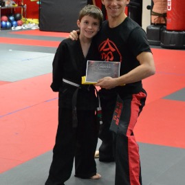 Teddy receives his yellow belt
