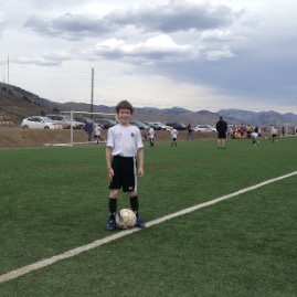 Timmy's first game on astro turf in Golden, CO