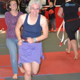 Pulling Darcy in the chariot race to untie belts