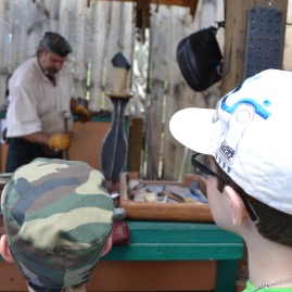 Watching the blacksmith at work