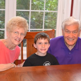 The birthday boy with Grandma and Grandpa