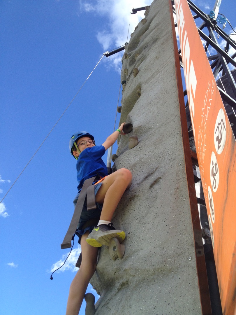 Climbing the rock wall at Avid4Adventure at school