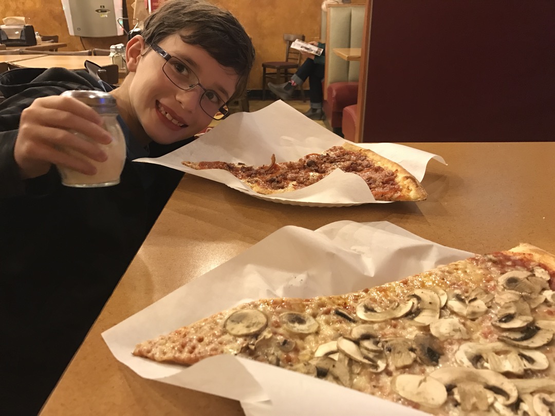Pizza slices as big as his head