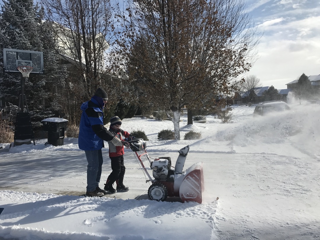 The boys take turns clearing Gatsby's driveway