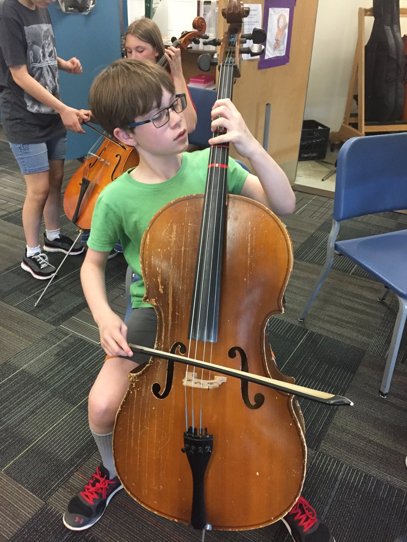 Checking out the cello