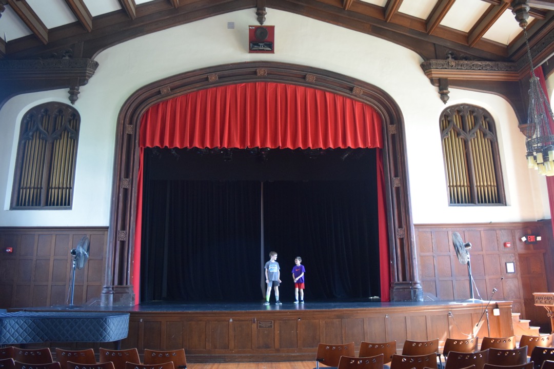 The boys on the Kiggins stage at Emma Willard School