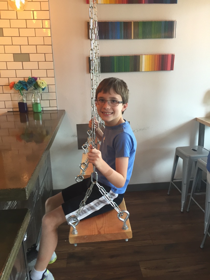Swinging at a funky ice cream shop