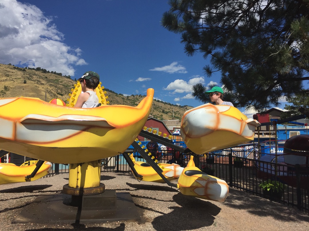 Riding banana planes at Heritage Amusement Park
