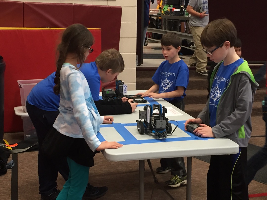 Tim and Ted's teams form a robotic alliance