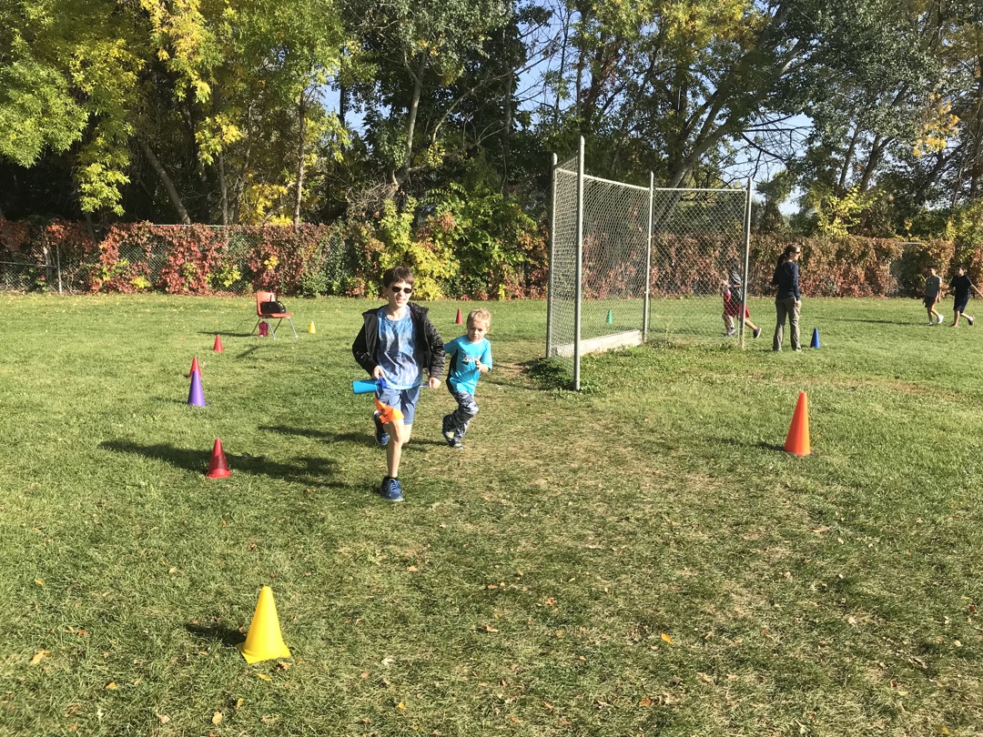 Ted and his kindergarten buddy running at the Jog-a-Thon