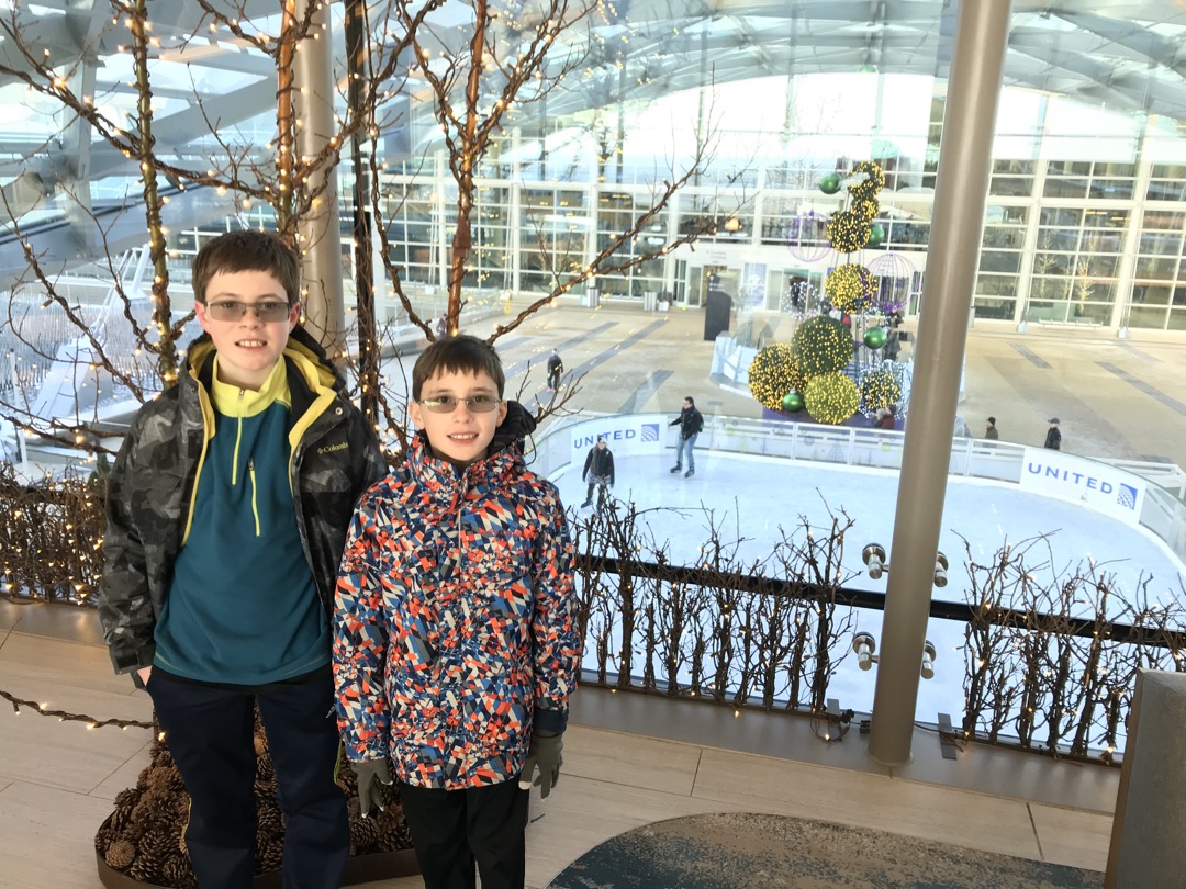 The boys do a little skating before picking Mom up at the airport