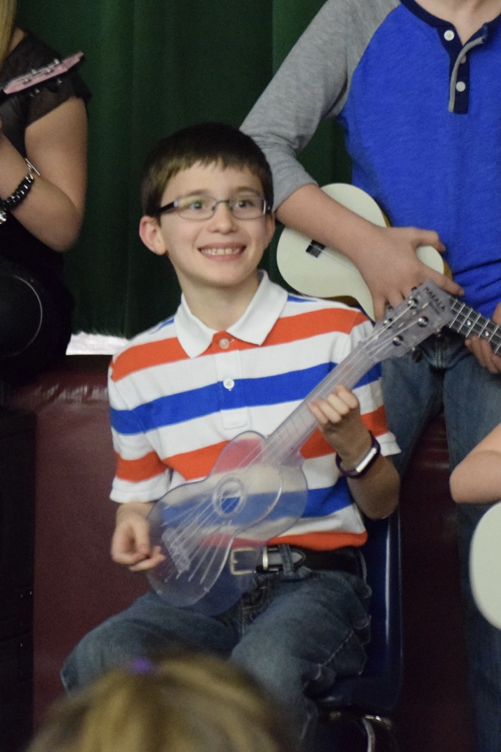 Ted's ready to rock out on the ukulele for 4th grade Arts Night