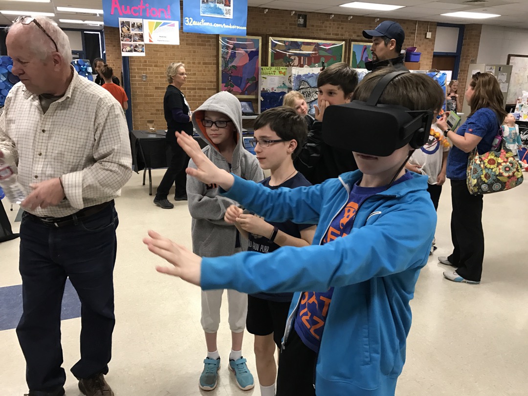 Tim tries out the VR goggles to explore a shipwreck