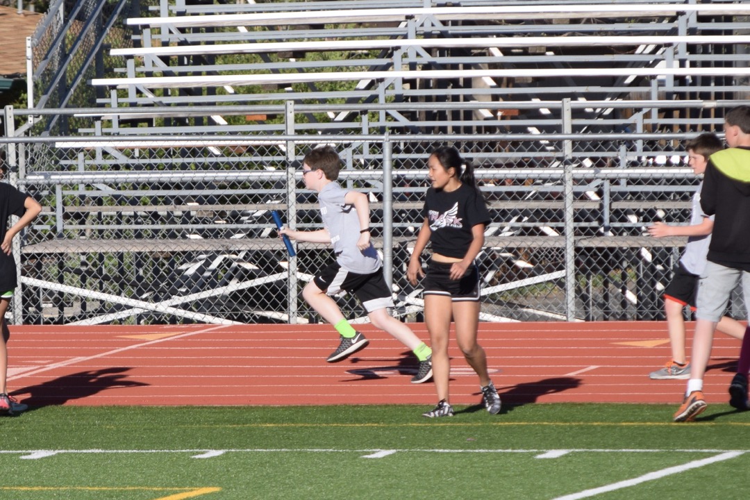 Tim fills in for a friend on the 4x200 relay