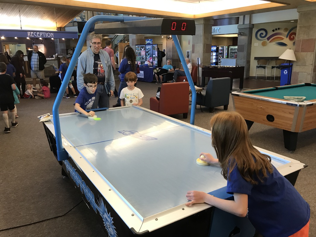 A little air hockey against a teammate