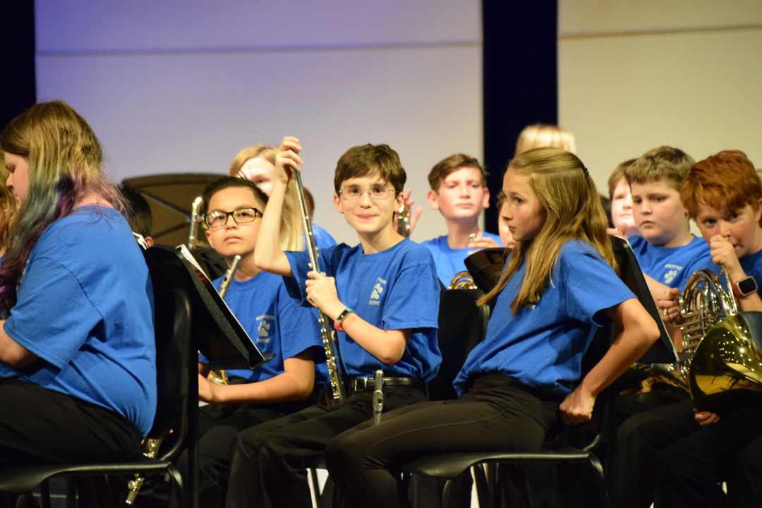 Ted's on stage for the first 6th grade band concert