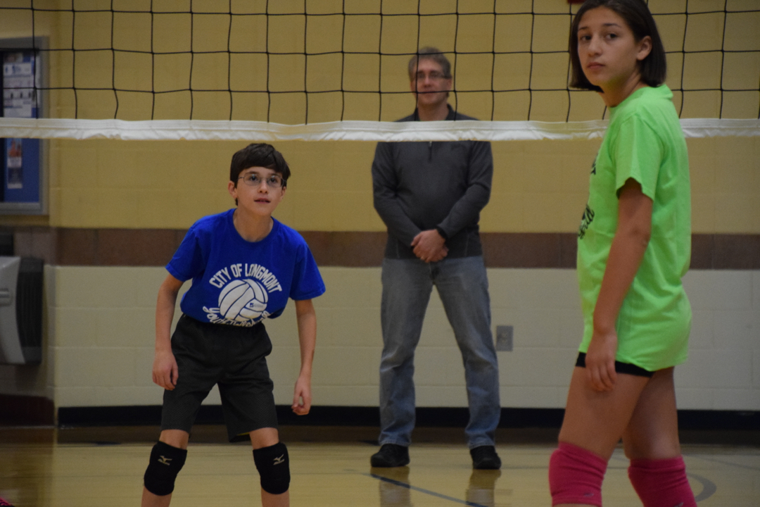 Ted's ready for the volleyball serve, and Jeff is a line judge