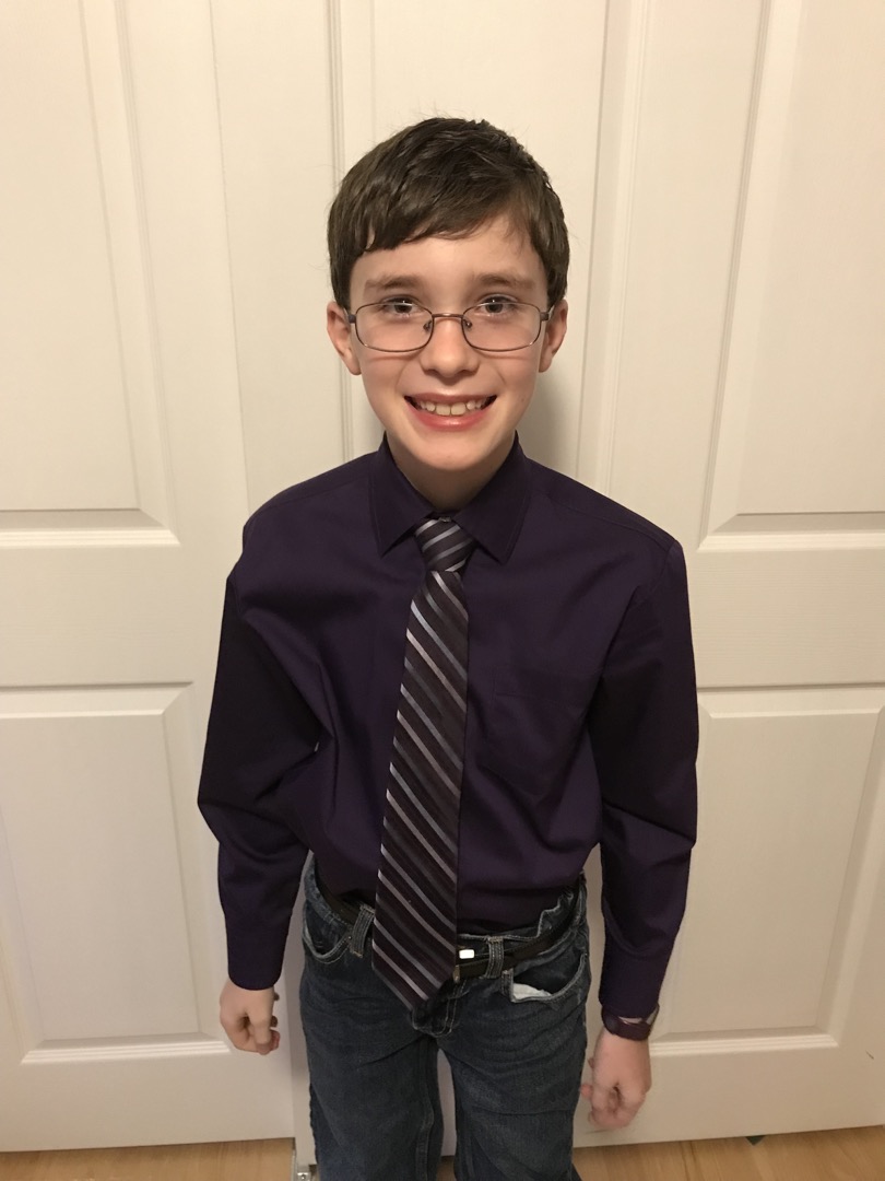 Ted's looking spiffy for his bank computer position at AmeriTowne