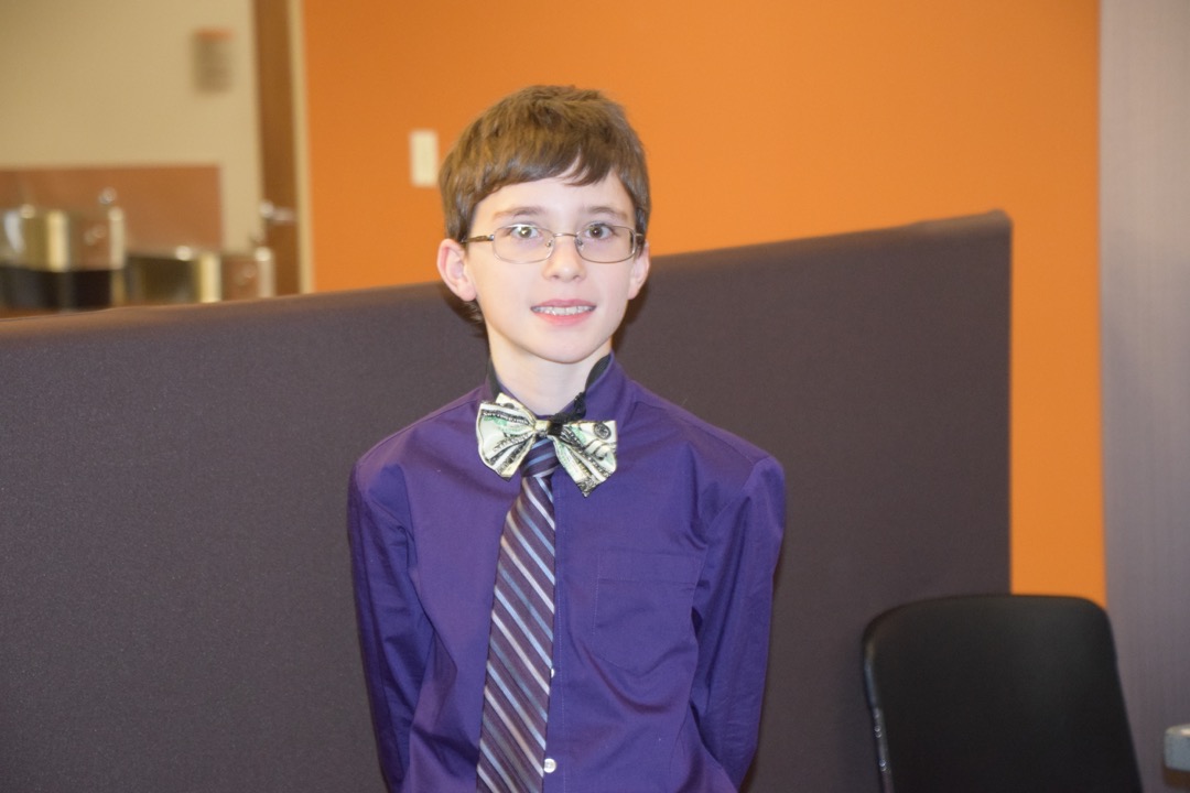 Even better when he gets a money tie for his tie