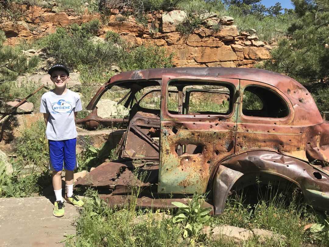Old car at the abandoned quarry