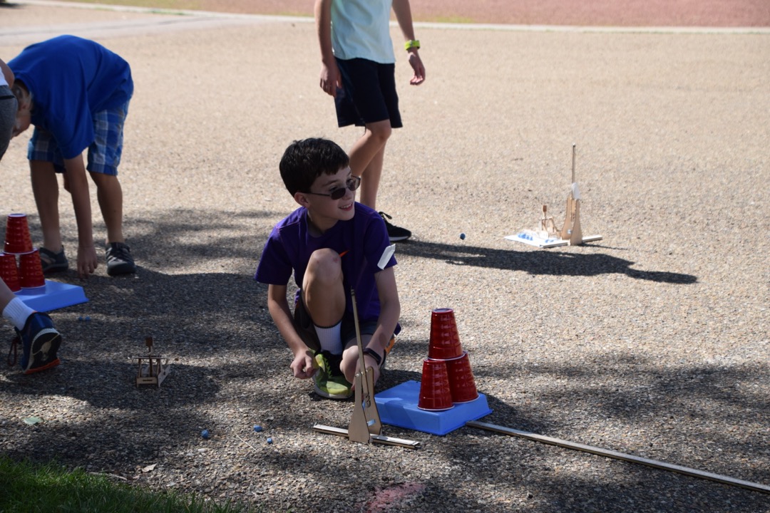 Ted shoots his trebuchet at Medieval Siege Weapons camp