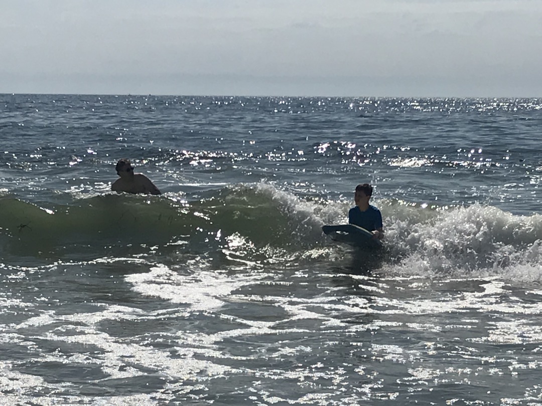 Dad and Tim hit the boogie boards