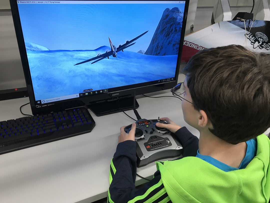 Flight simulator at the grand opening of the district's Innovation Center