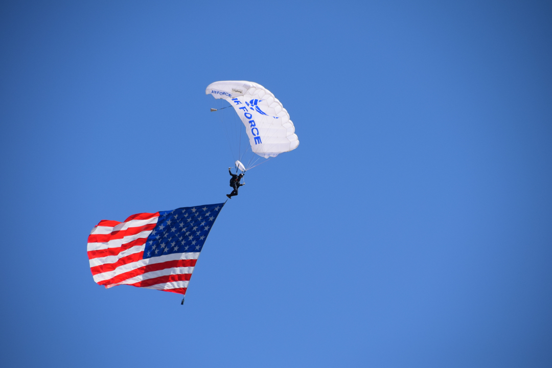 Air Force cadet brings in the flag