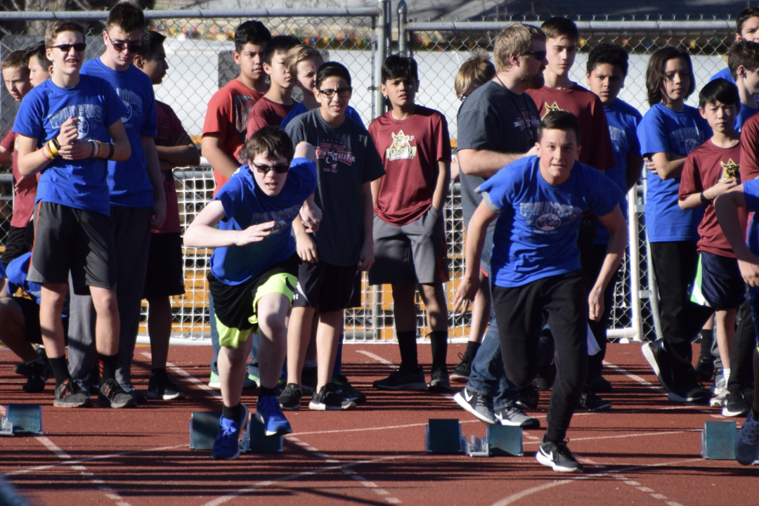Tim and SIlas in the 100M dash