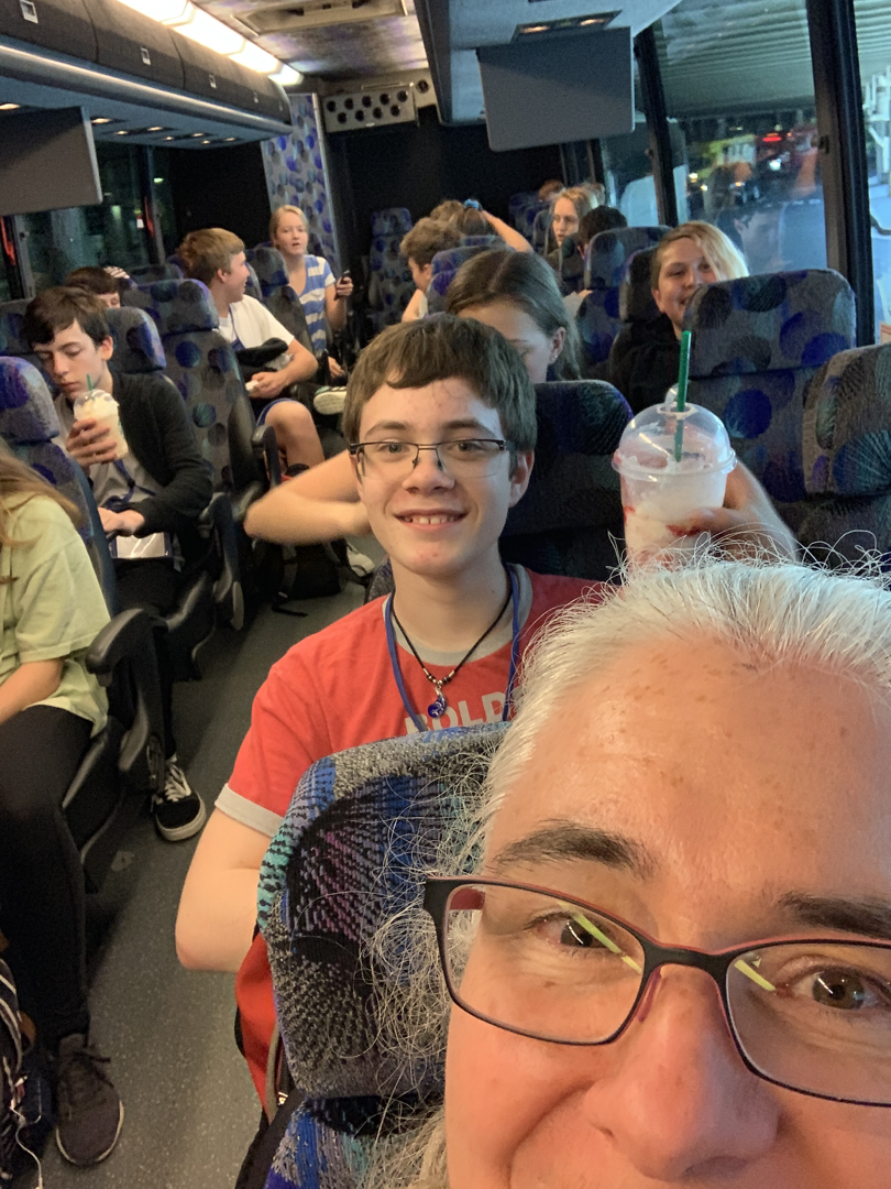 Mom and Tim on the bus for the 8th grade field trip to Washington, DC