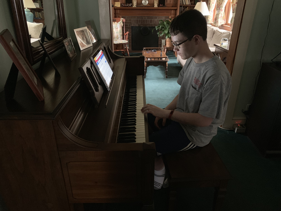 Tim plays the piano