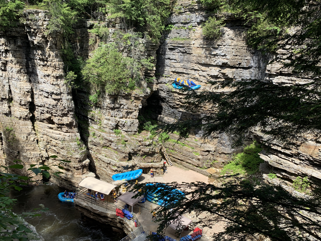 They have to lower the rafts from the top of the cliff