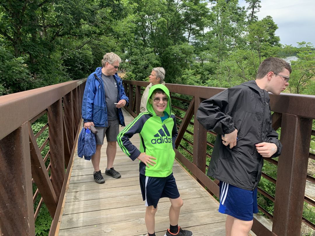 Ted poses, Tim sees a yucky bug