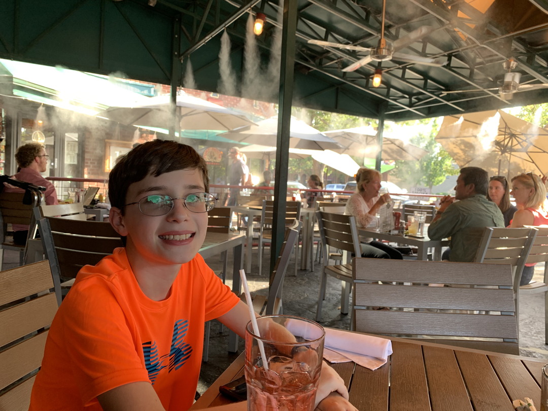 Shady dinner under the cooling mist
