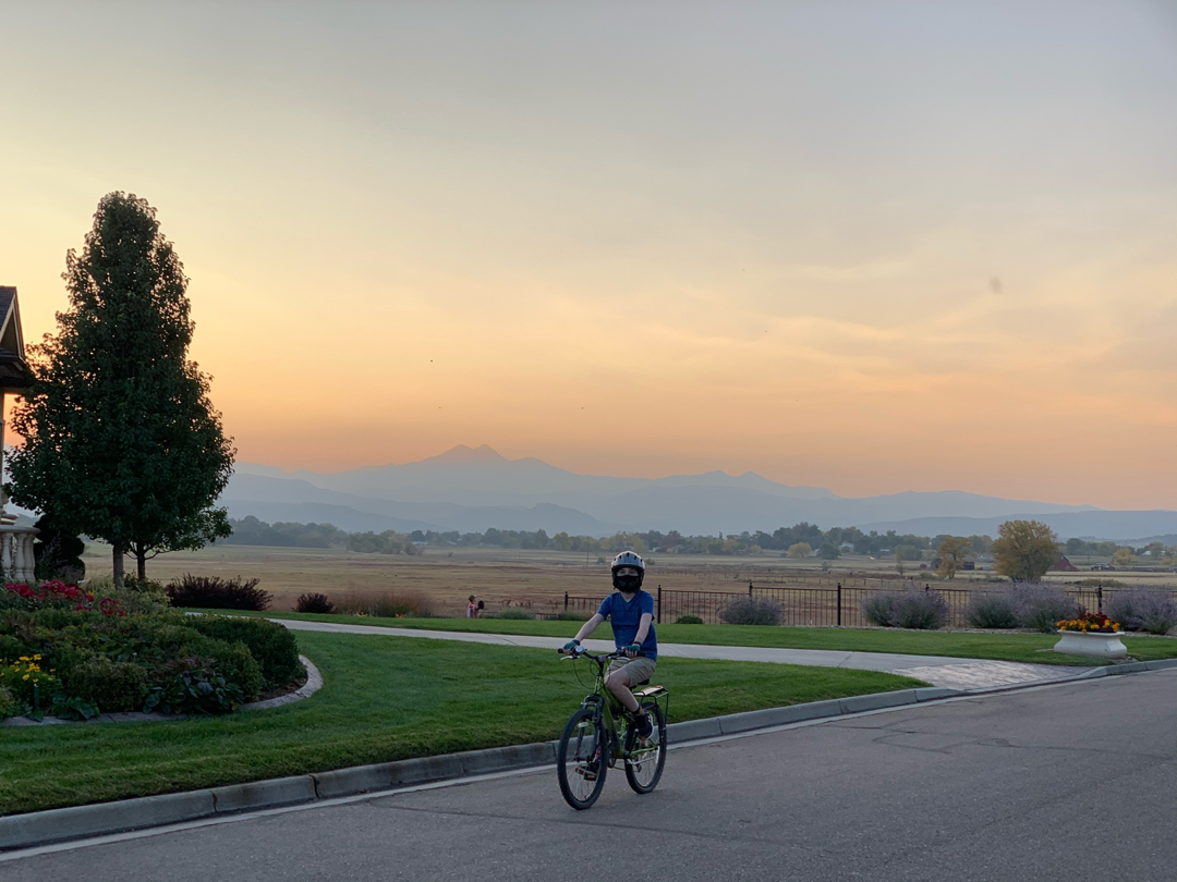 Bike riding with wildfire sunset