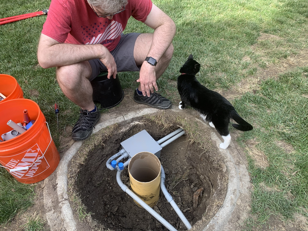 Henry helps with the backyard project