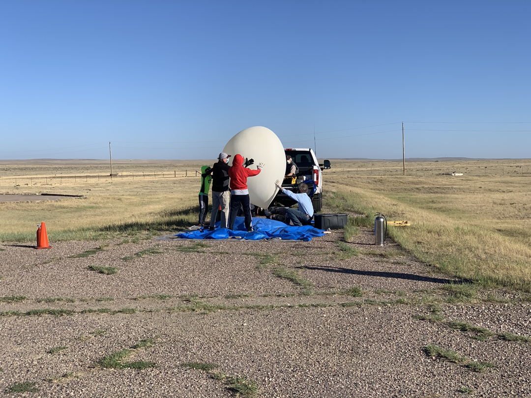 Attempting to control the balloon in the wind