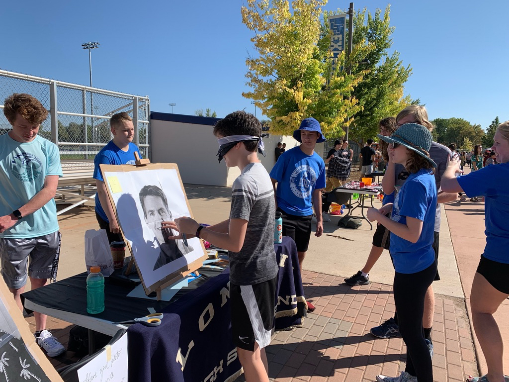Band booth at Homecoming Carnival