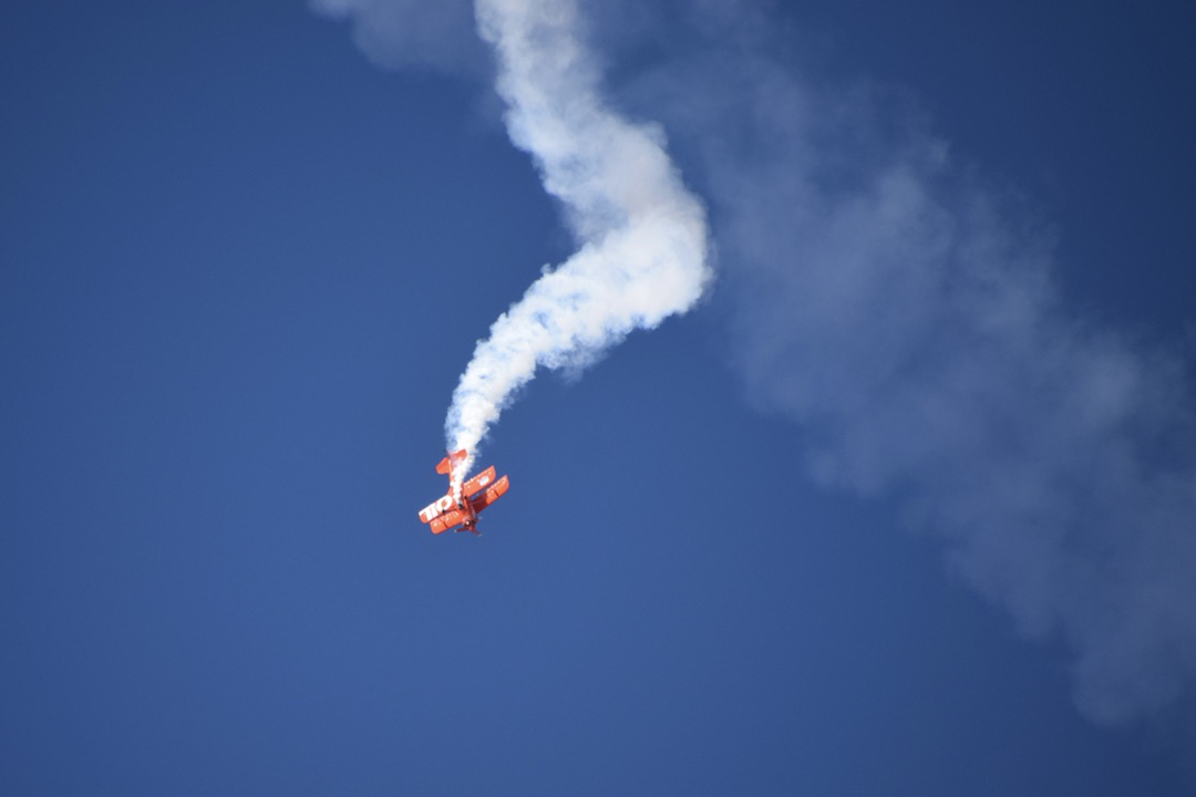 The Lucas Oil biplane makes a dramatic roll