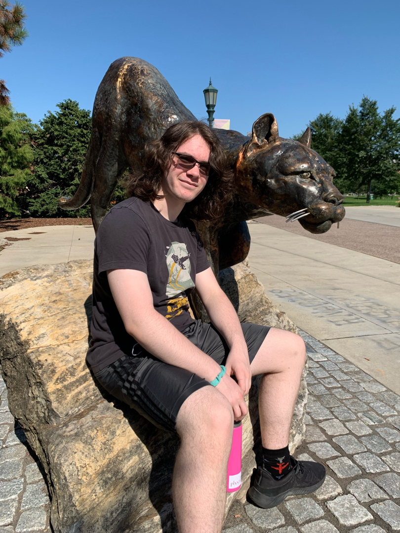 Tim with the UVM Catamount on his tour