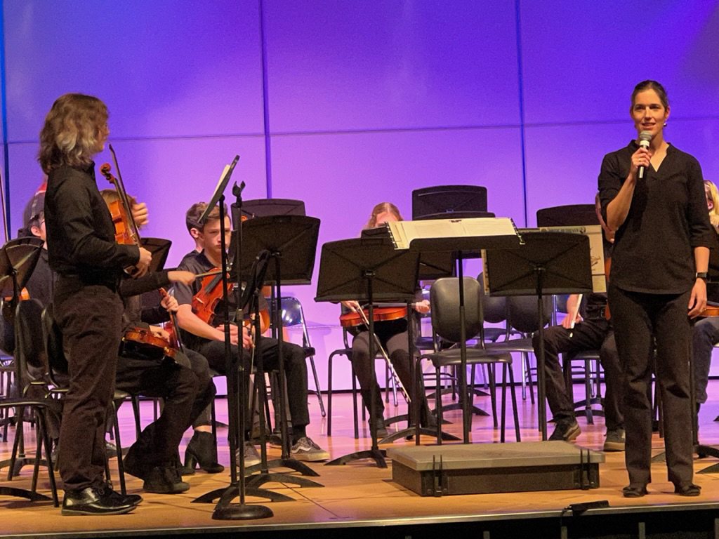 Tim back on stage for orchestra with a solo
