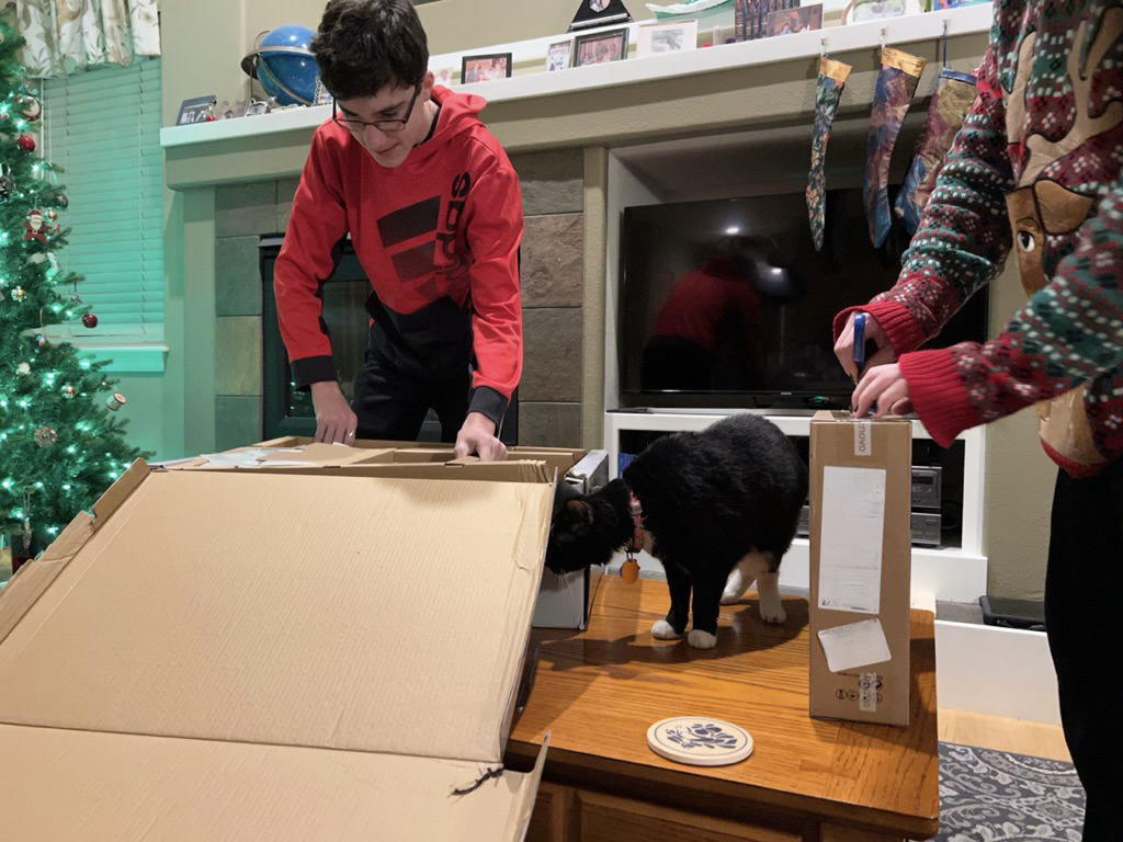 Henry helps with Santa gifts