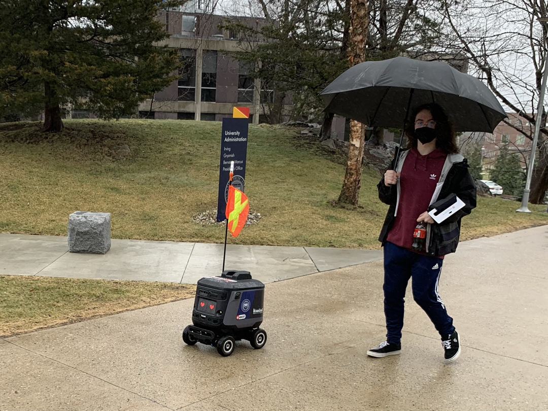 Tim and the Kiwibot food delivery robot at Brandeis