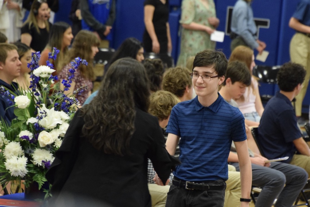Shaking the Assistant Principal's hand