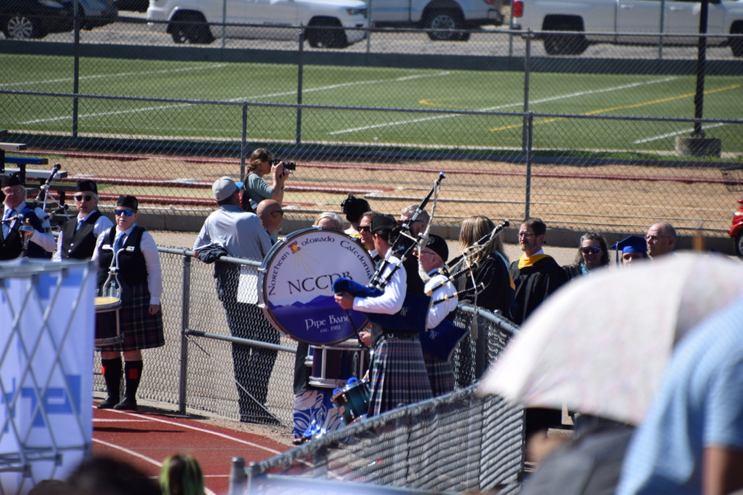 Here comes the pipe band
