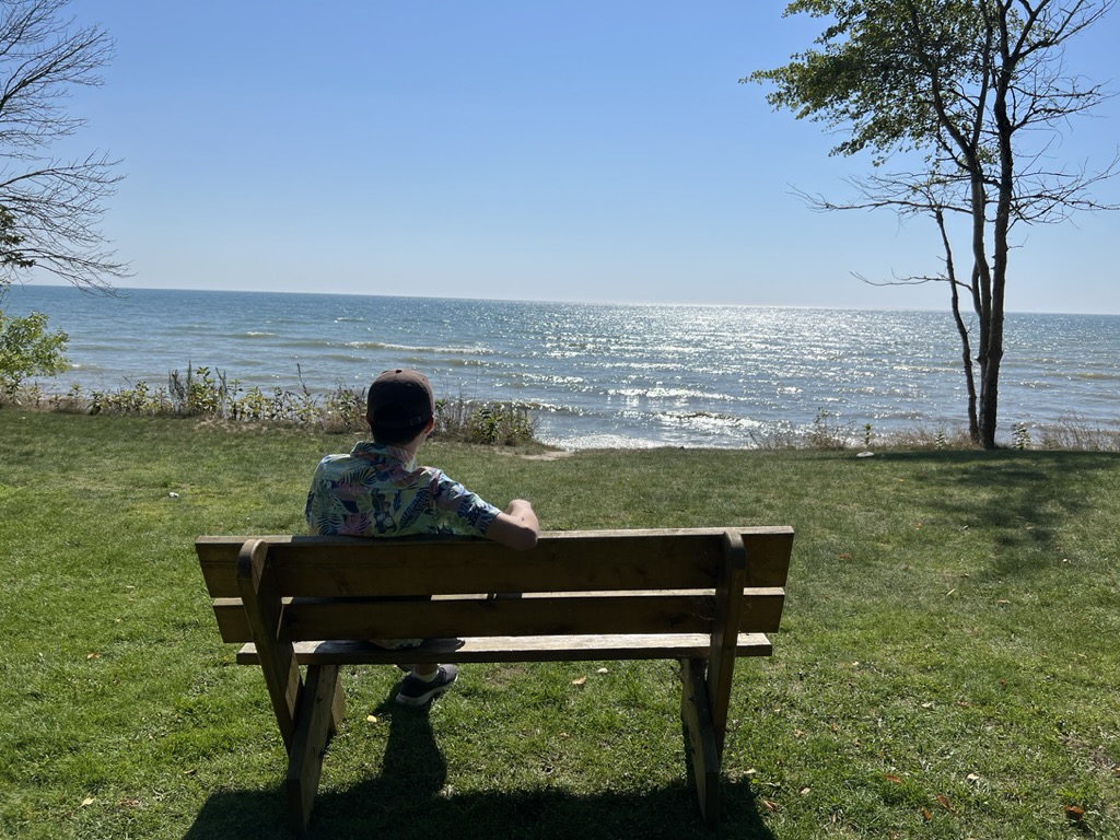 Ted contemplates the vast lake
