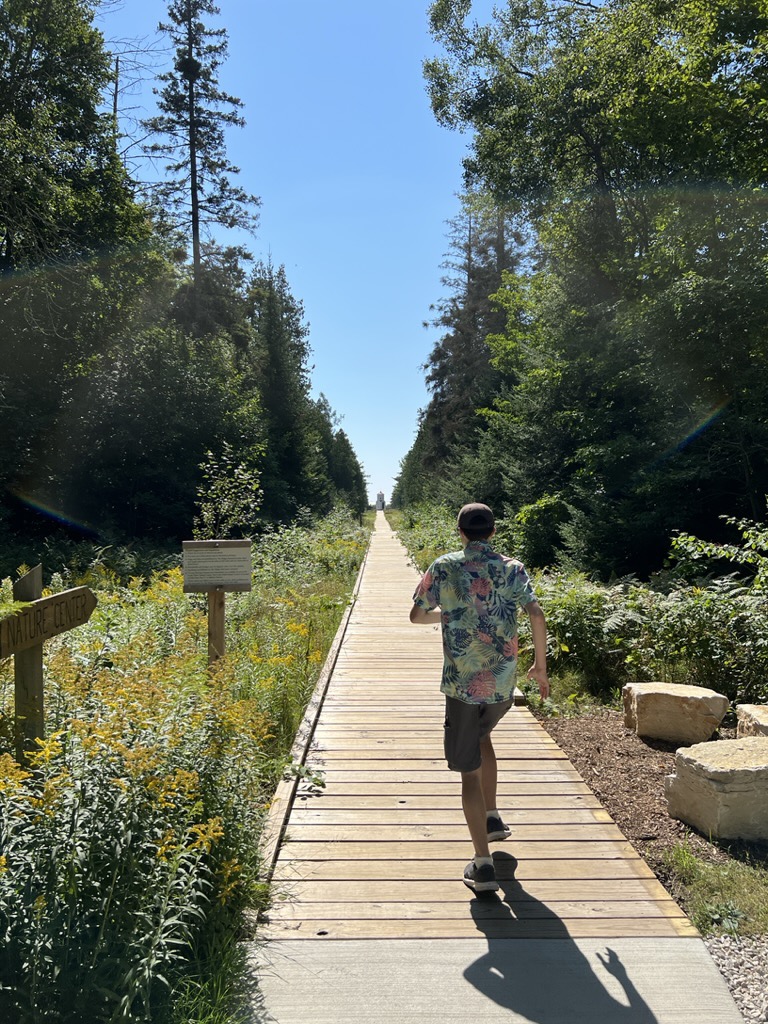 Ted runs down the boardwalk to the Rangelight