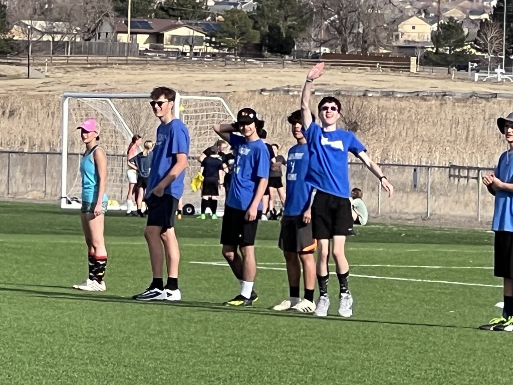 Ted's playing ultimate frisbee